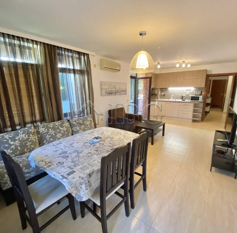 Bright living room with dining area and large windows in Etara 3, Sveti Vlas.
