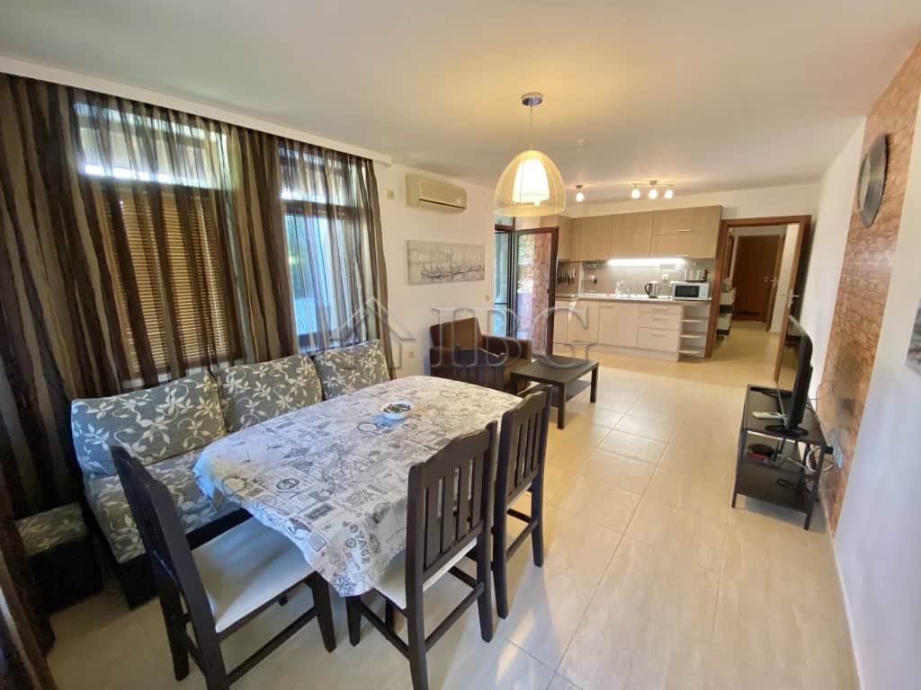 Bright living room with dining area and large windows in Etara 3, Sveti Vlas.