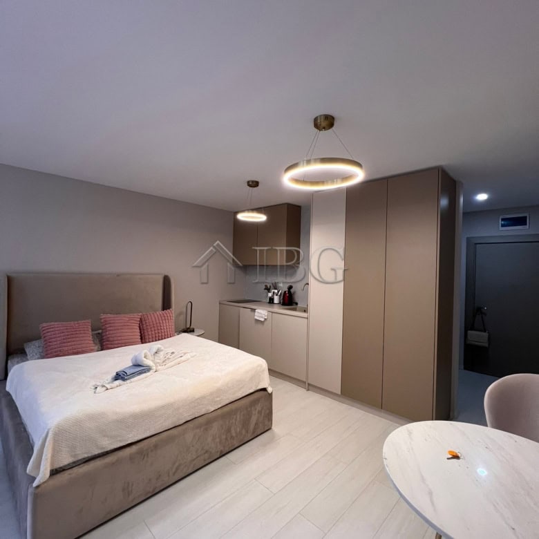 Stylish studio apartment with balcony, modern furnishings, and bright interior in J’adore Secret Gar.
