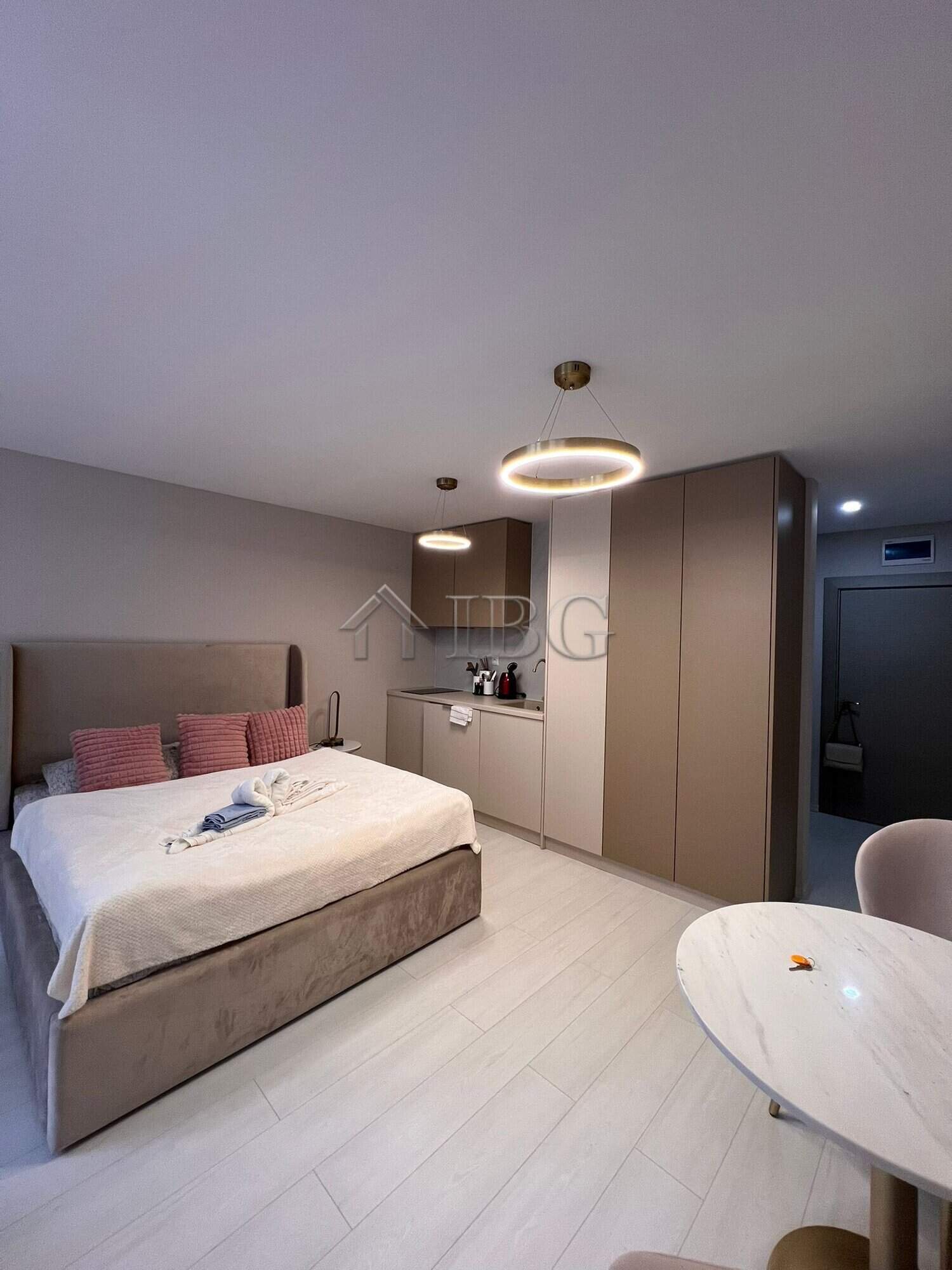 Stylish studio apartment with balcony, modern furnishings, and bright interior in J’adore Secret Gar.