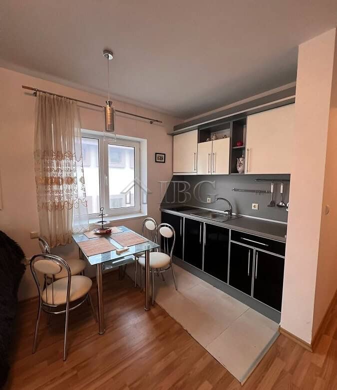 Bright studio apartment with balcony in Sveti Vlas village. Modern kitchen, dining area, and natural.
