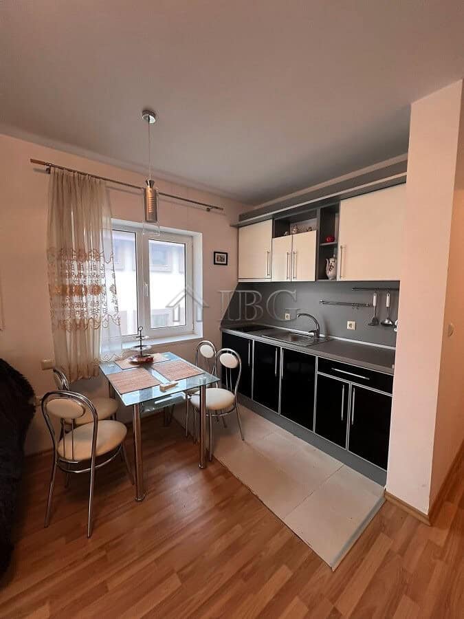 Bright studio apartment with balcony in Sveti Vlas village. Modern kitchen, dining area, and natural.