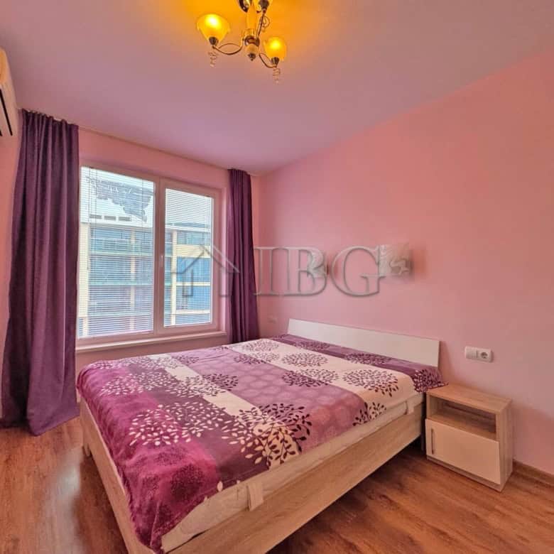 Bright 1-bedroom apartment with pool view in Sunny Beach, Bulgaria. Modern interior, large window, a.