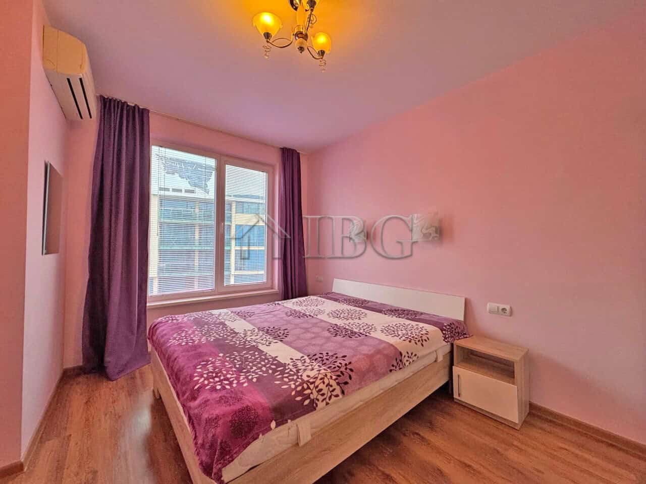 Bright 1-bedroom apartment with pool view in Sunny Beach, Bulgaria. Modern interior, large window, a.