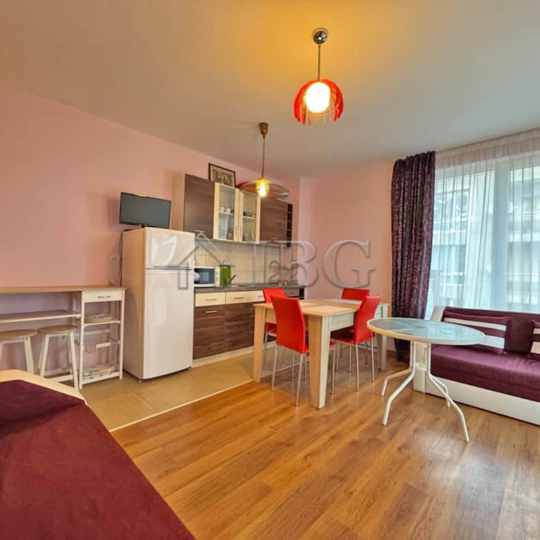 Bright 1-bedroom apartment with pool view in Sunny Beach, featuring modern furnishings and a comfort.