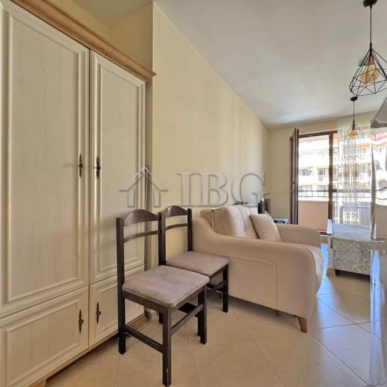 Bright living room with sofa and chairs at Cascadas Family Resort, Sunny Beach.