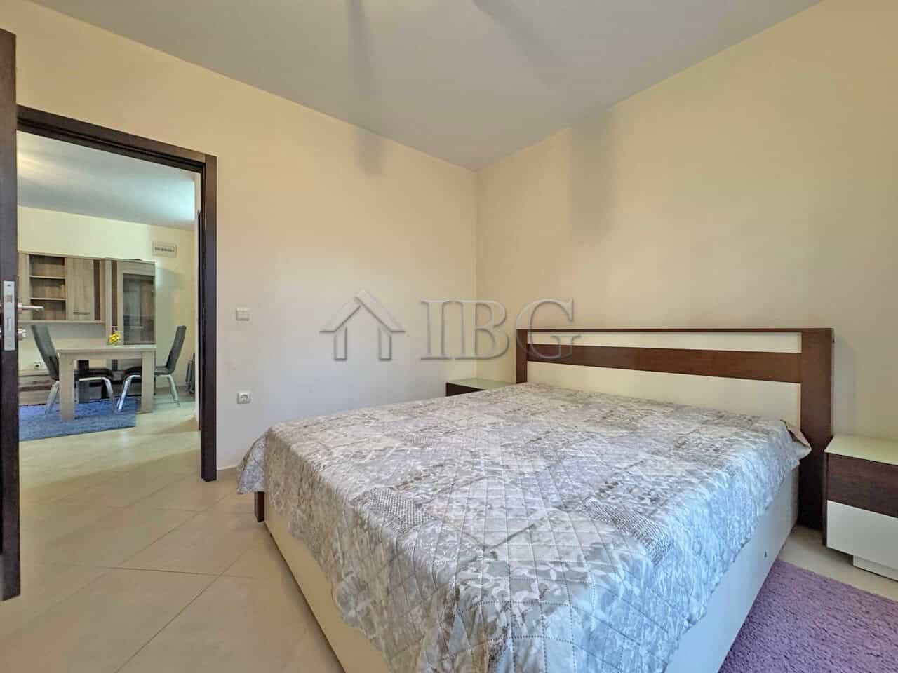 Comfortable bedroom with modern decor in Sunny Beach resort.