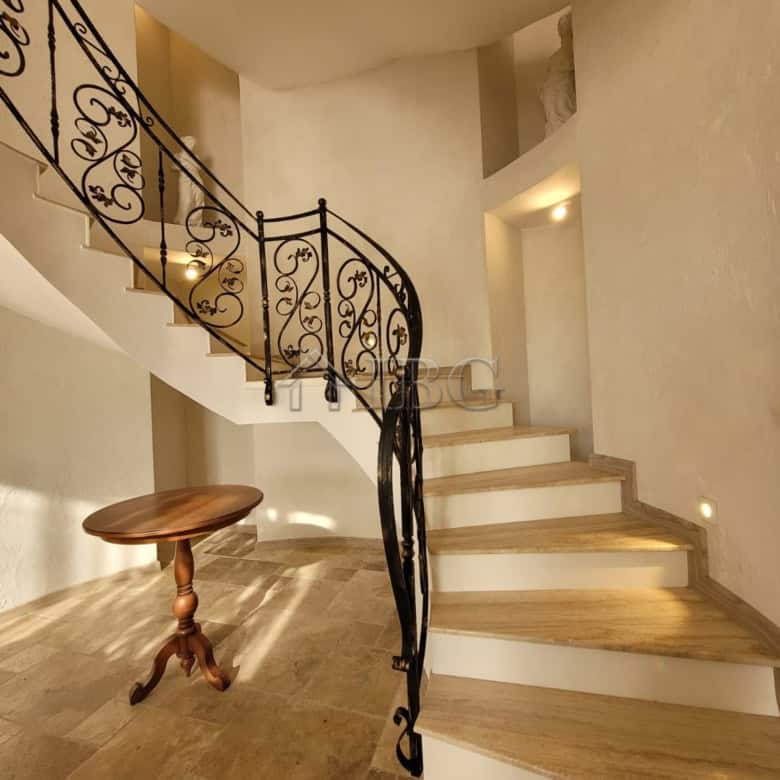 Elegant interior of a three-level maisonette with a spiral staircase and sea views in Sveti Vlas.