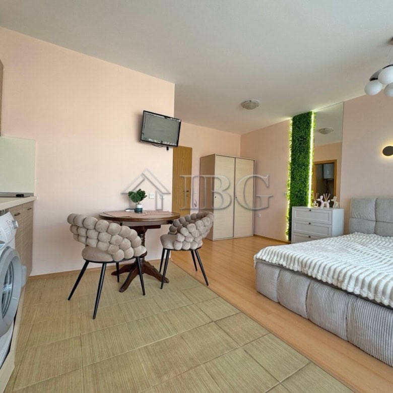 Modern studio apartment with balcony in Diamond Bay, Sunny Beach, offering comfortable living space.