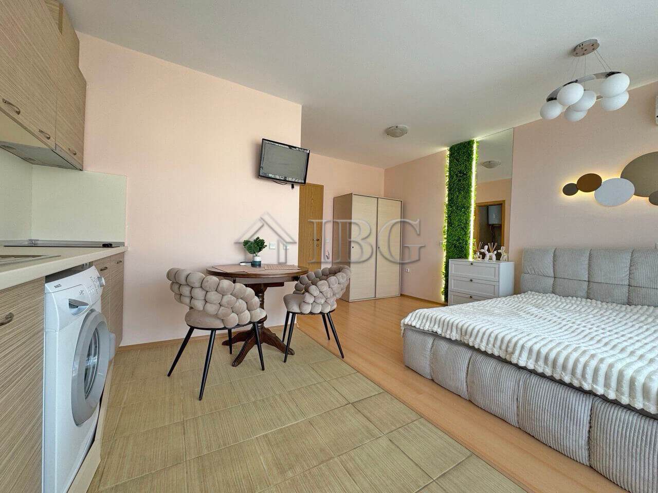 Modern studio apartment with balcony in Diamond Bay, Sunny Beach, offering comfortable living space.