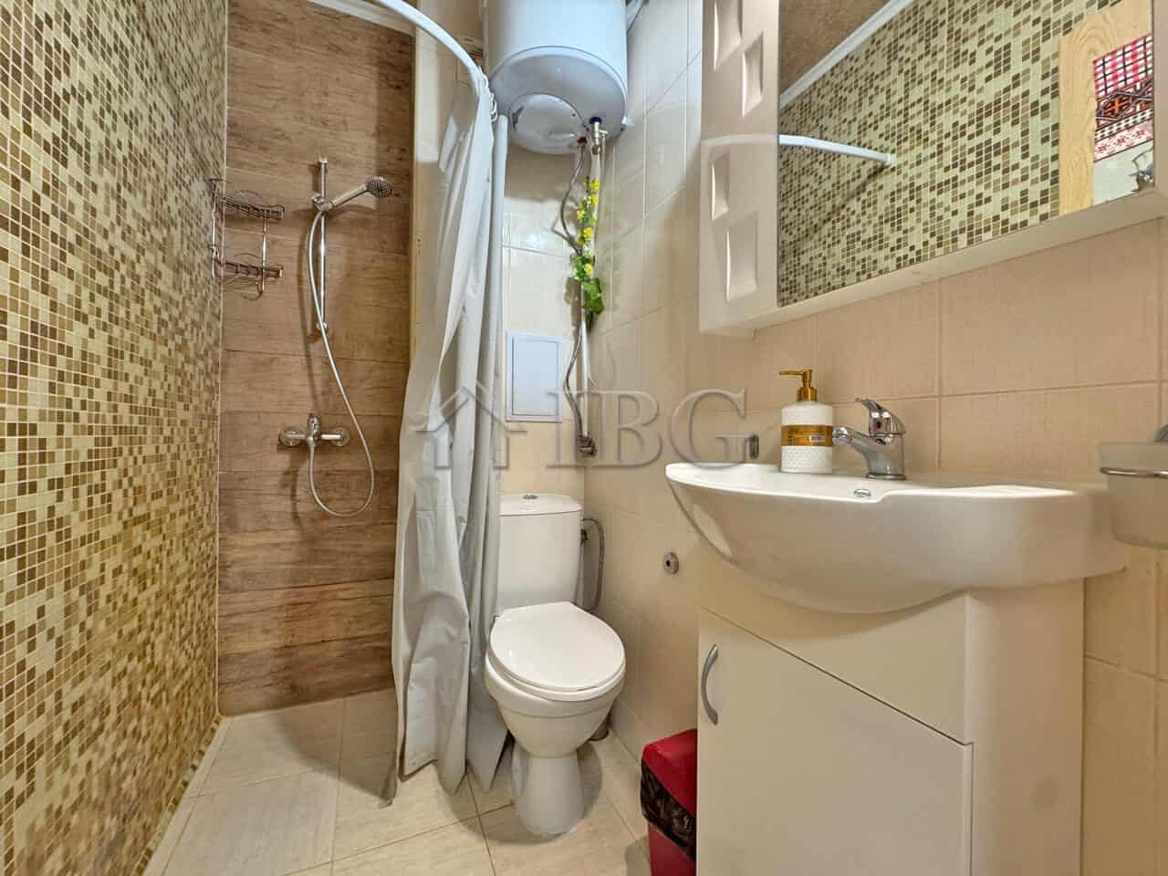 Compact bathroom in a studio apartment at Diamond Bay, Sunny Beach.