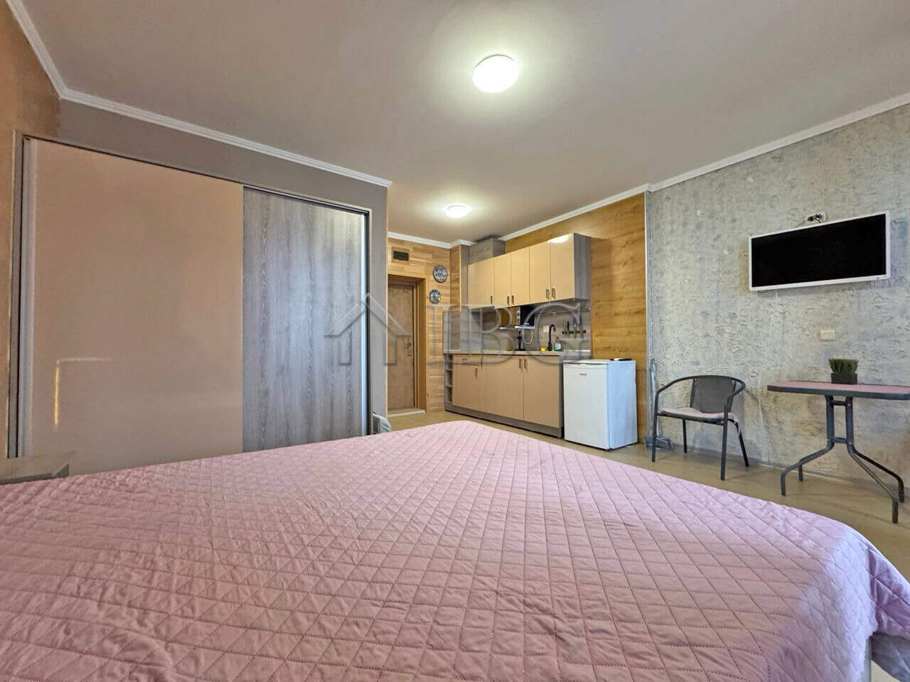 Apartment interior with kitchenette and living area in Diamond Bay, Sunny Beach.