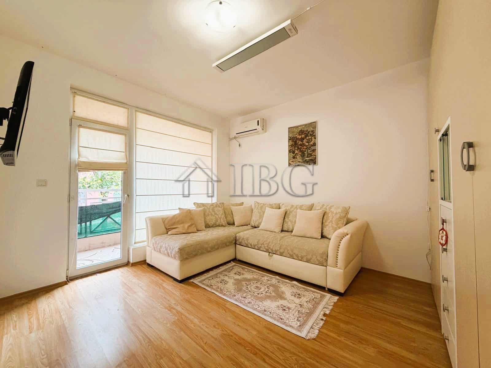 Bright 2-bedroom apartment overlooking park and tennis court, sunny day, modern interior, ideal for.