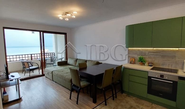 Bright apartment featuring a spacious living area, modern kitchen, and large balcony overlooking the.