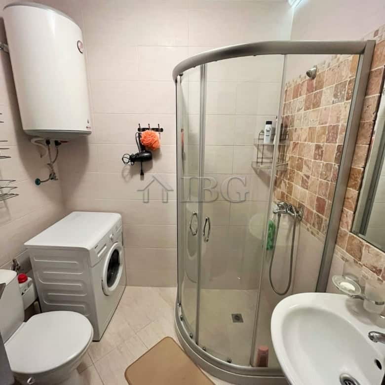 Bright bathroom in a furnished 1-bedroom apartment at Cascadas Family Resort, Sunny Beach.