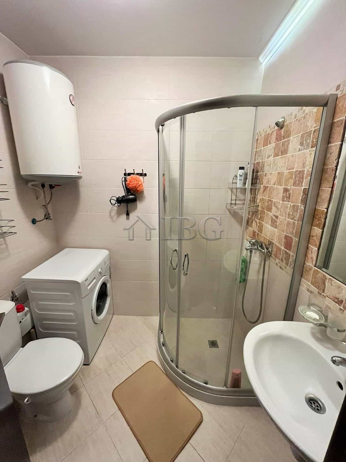 Bright bathroom in a furnished 1-bedroom apartment at Cascadas Family Resort, Sunny Beach.