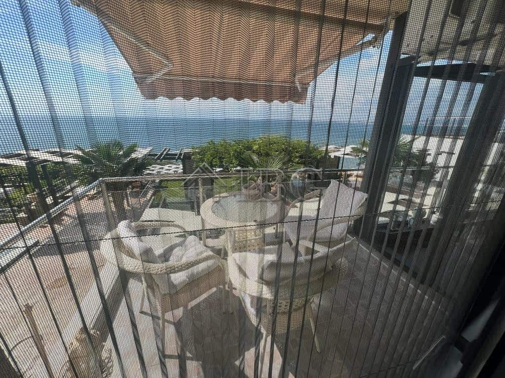 Elegant balcony with sea view and outdoor seating in Sveti Vlas.