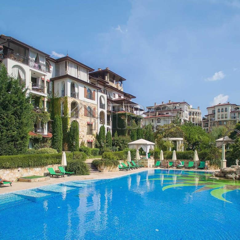 Modern 2-bedroom apartment in Esteban Complex, Nessebar, with scenic pool views.