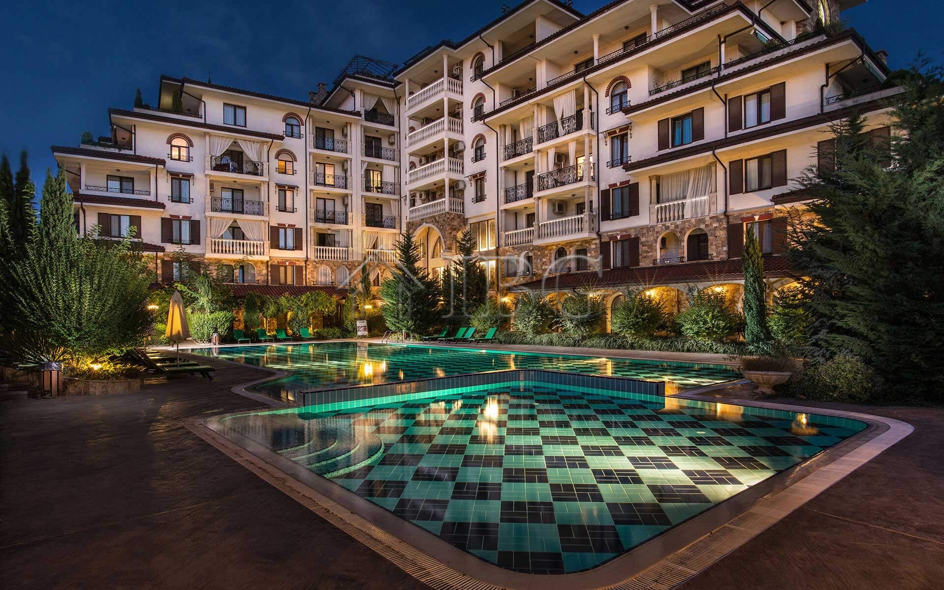Bright 2-bedroom apartment in Esteban Complex, Nessebar, with modern amenities and scenic views.