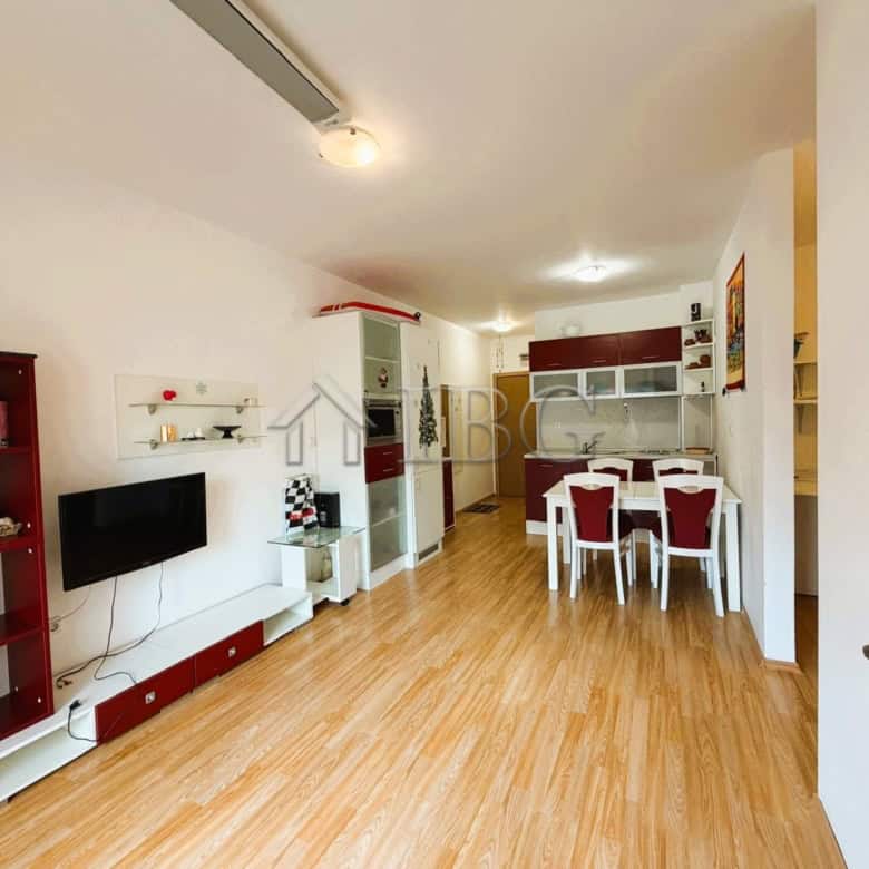Bright 2-bedroom apartment overlooking park and tennis courts, sunny day, modern furnishings, ideal.