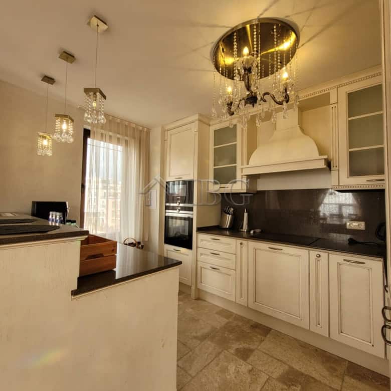 Elegant kitchen in a three-level maisonette overlooking the sea in Sveti Vlas. Modern design with hi.