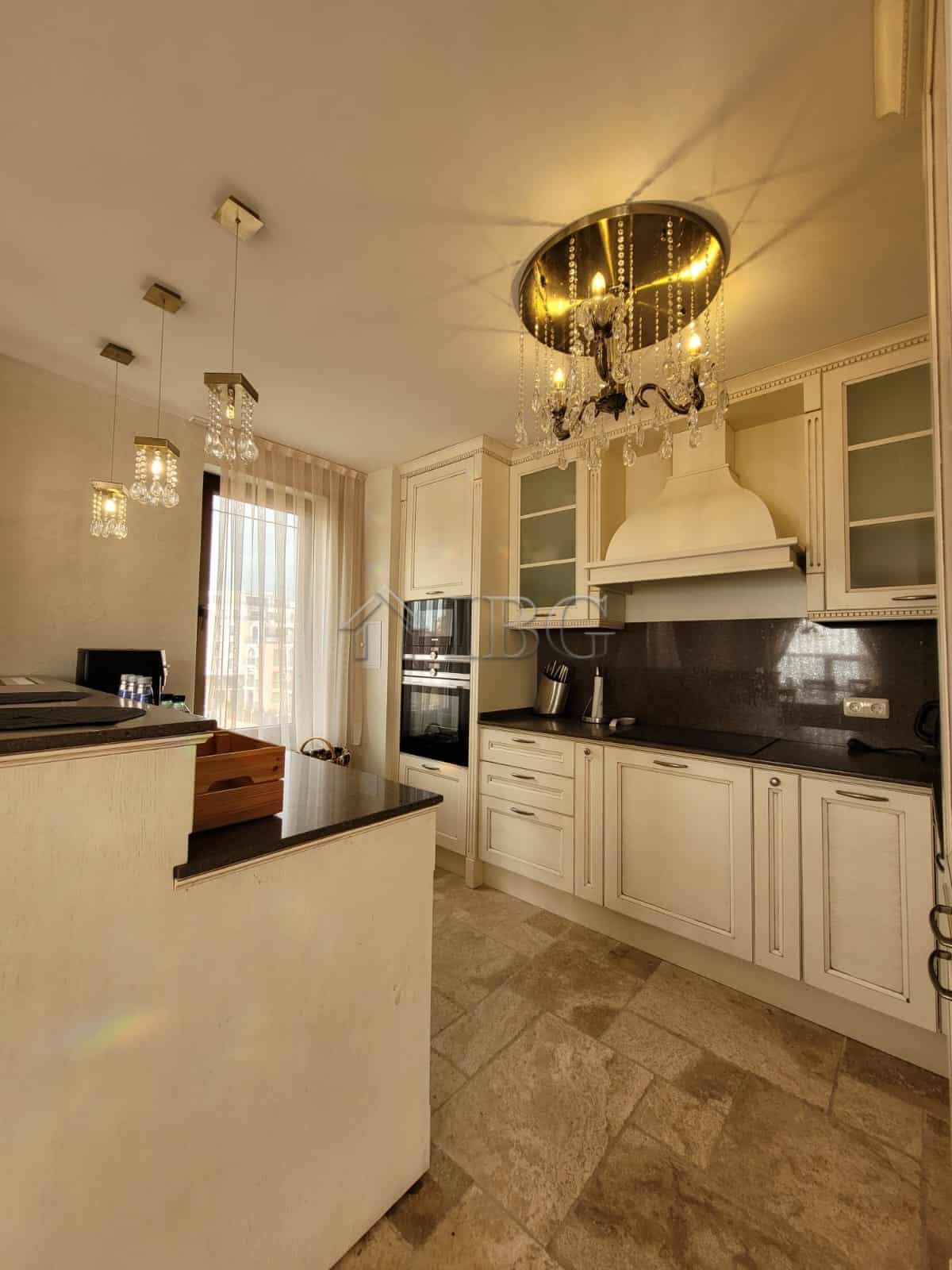 Elegant kitchen in a three-level maisonette overlooking the sea in Sveti Vlas. Modern design with hi.