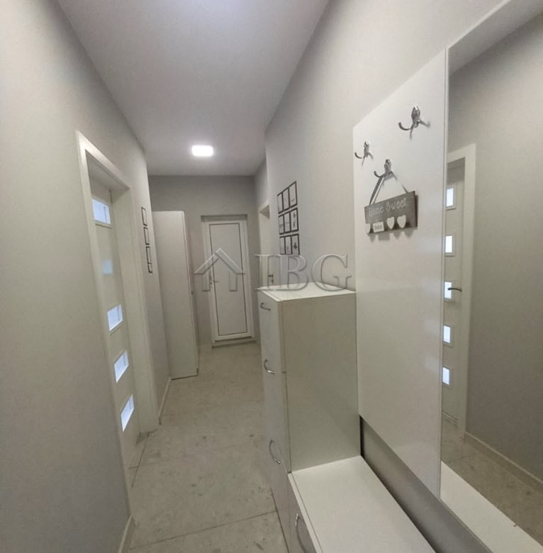 Bright, minimalist interior with stylish decor and functional storage.
