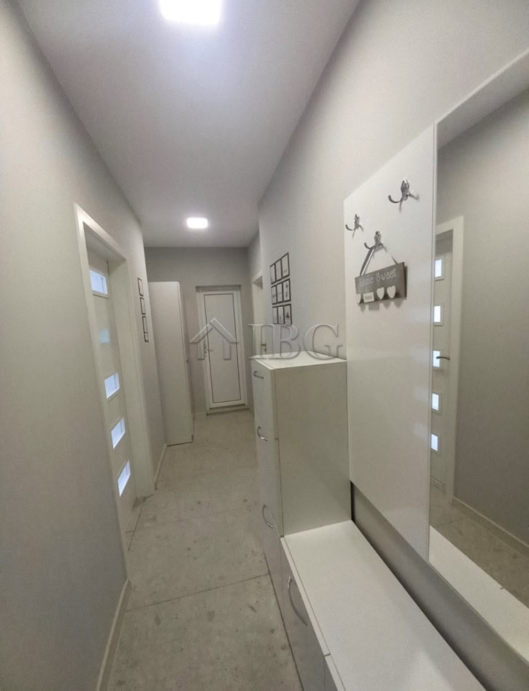 Bright, minimalist interior with stylish decor and functional storage.