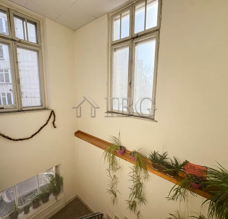 Bright office for rent in the center of Ruse, featuring large windows, high ceilings, and a welcomin.