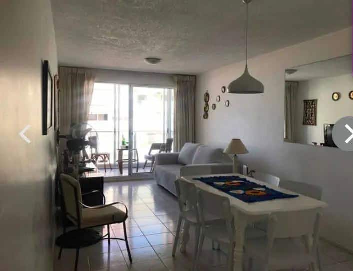 Bright living room with balcony view in Punta del Este.