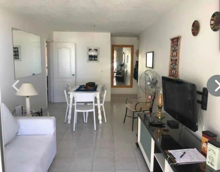Bright living room with modern furniture and TV in La Pastora, Punta del Este, Maldonado.
