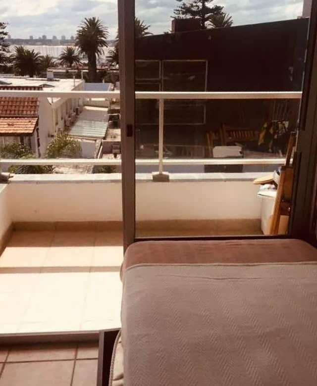 Bright apartment with balcony overlooking the city and ocean views in Maldonado. Perfect for seaside.