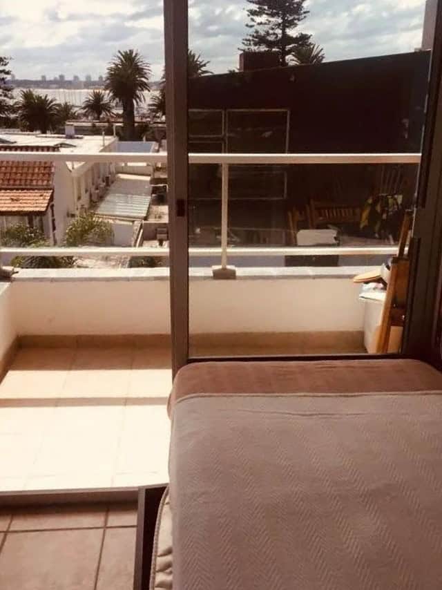 Bright apartment with balcony overlooking the city and ocean views in Maldonado. Perfect for seaside.