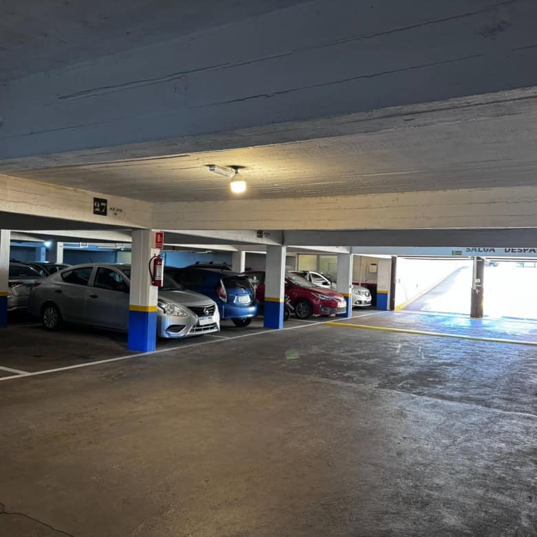 Parking lot with multiple cars in a covered garage in Punta del Este, Maldonado.