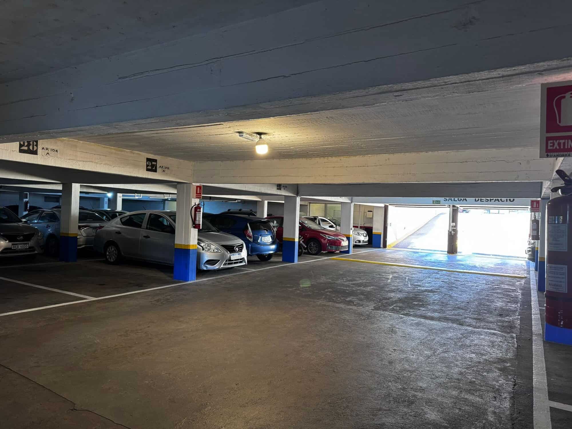 Parking lot with multiple cars in a covered garage in Punta del Este, Maldonado.