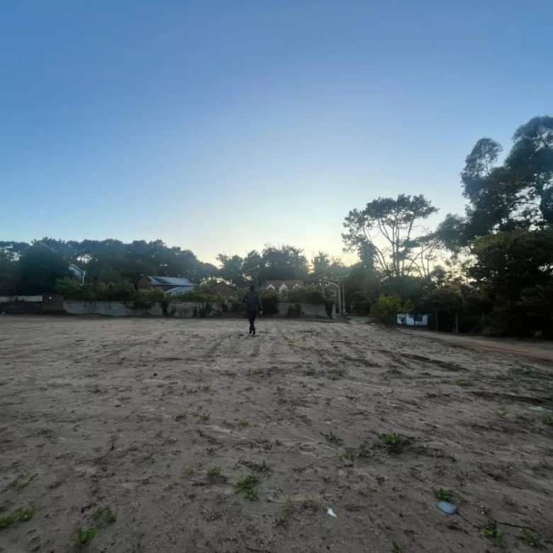 Empty building lot for sale in Punta del Este golf course community. Ideal for constructing a custom.