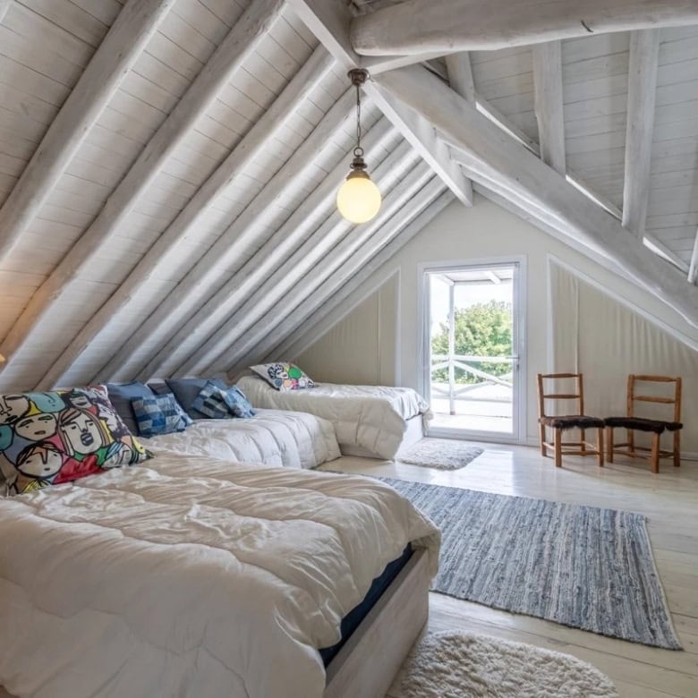 Attic country house for sale in Punta Ballena, Maldonado, featuring cozy interiors and scenic views.