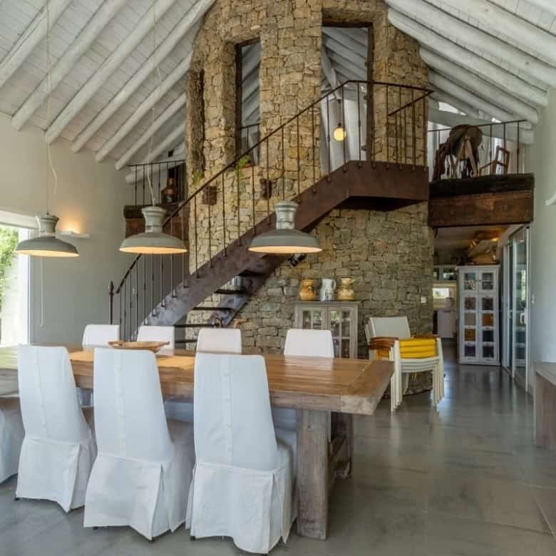 Charming country house with spacious dining area and rustic interior design.