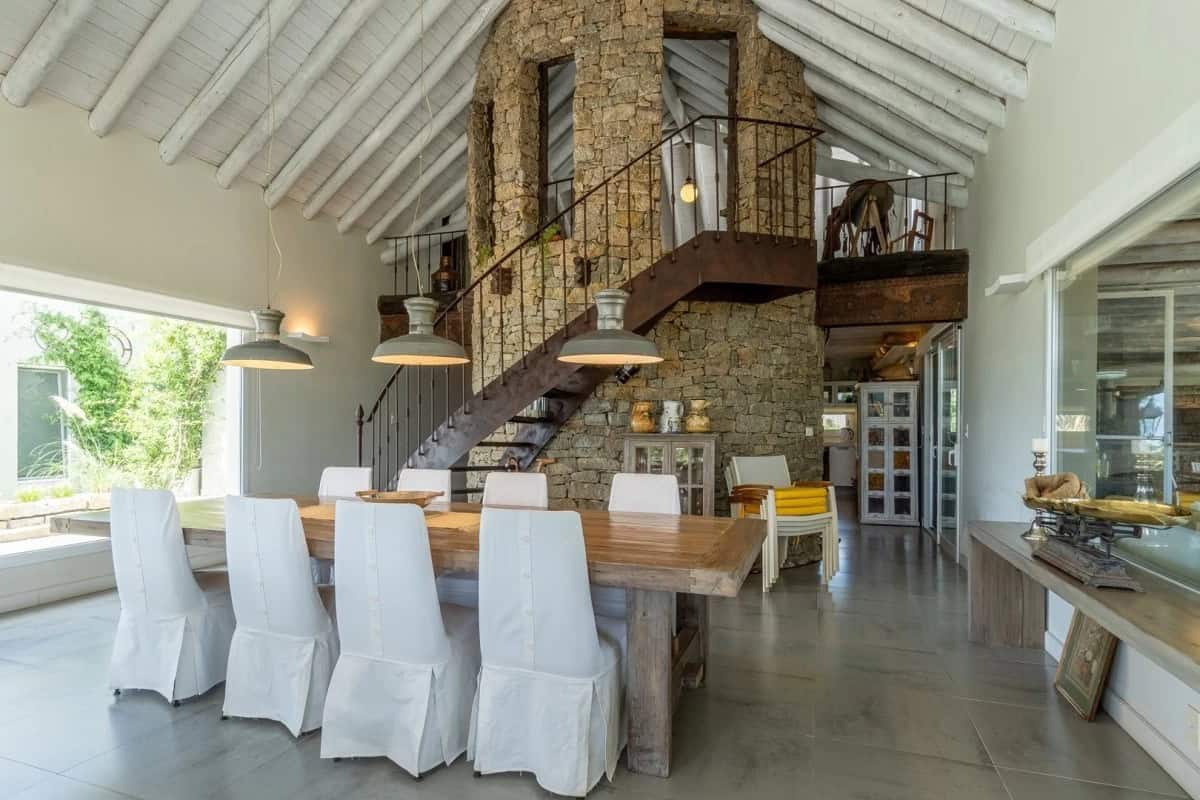 Charming country house with spacious dining area and rustic interior design.