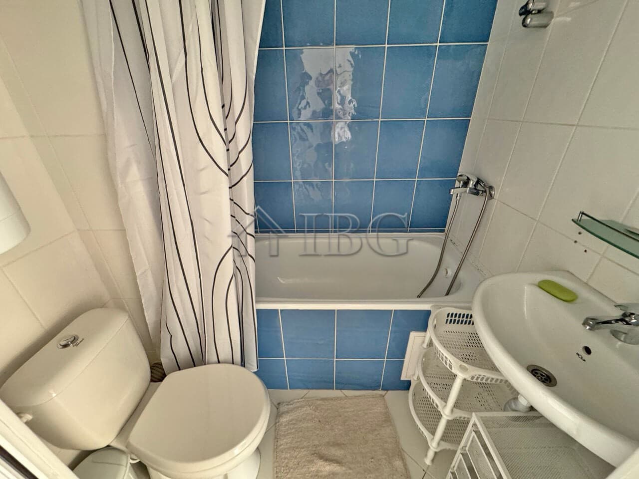 Bright bathroom with bathtub and shower in Gerber Residence 3, Sunny Beach.