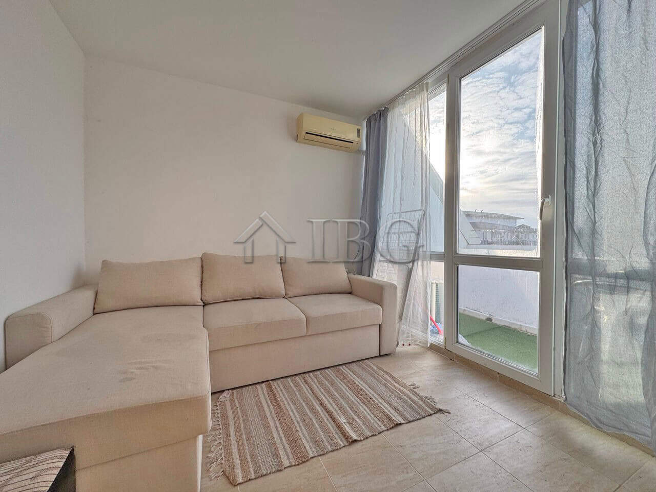 Bright living room with large windows and sea view in Gerber Residence 3.