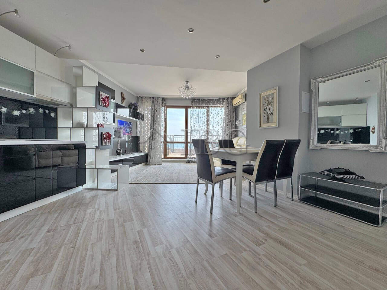 Spacious beachfront 1-bedroom apartment with modern decor and sea views at Grand Hotel Sveti Vlas.