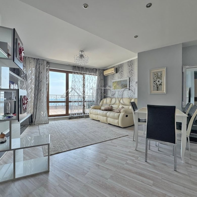 Bright beachfront 1-bedroom apartment with modern furnishings at Grand Hotel Sveti Vlas.