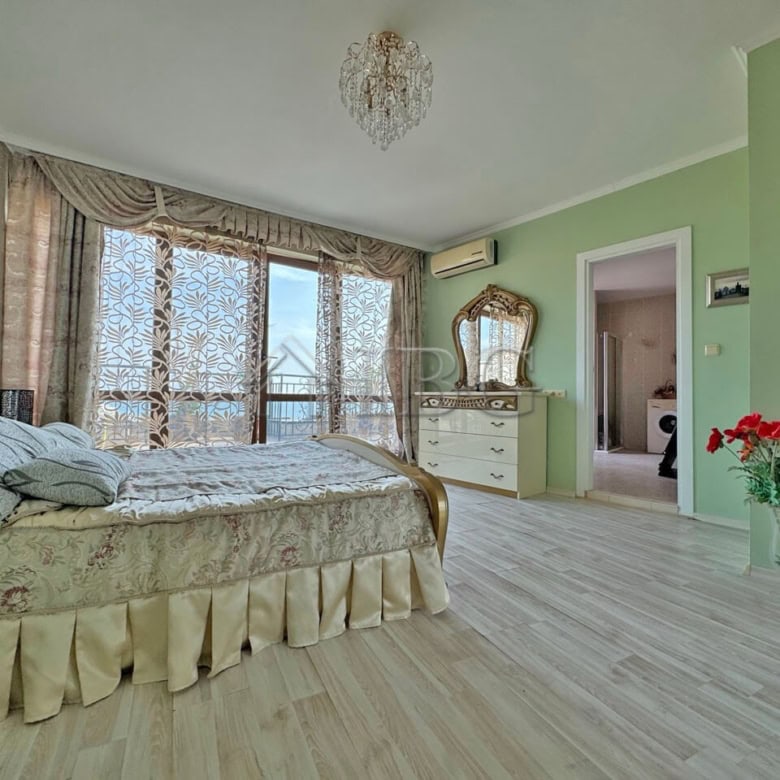 Beachfront 1-bedroom apartment with spacious living area and sea views at Grand Hotel Sveti Vlas.