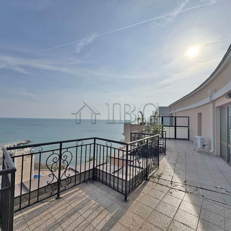Spacious balcony of a beachfront 1-bedroom apartment with ocean views at Grand Hotel Sveti Vlas.