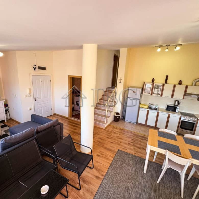 Spacious apartment with sea view, modern decor, and open living space in Sunny Beach.