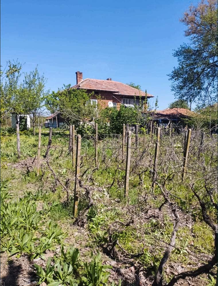 Two-storey house with a large garden in a peaceful village setting. Ideal for family living and outd.