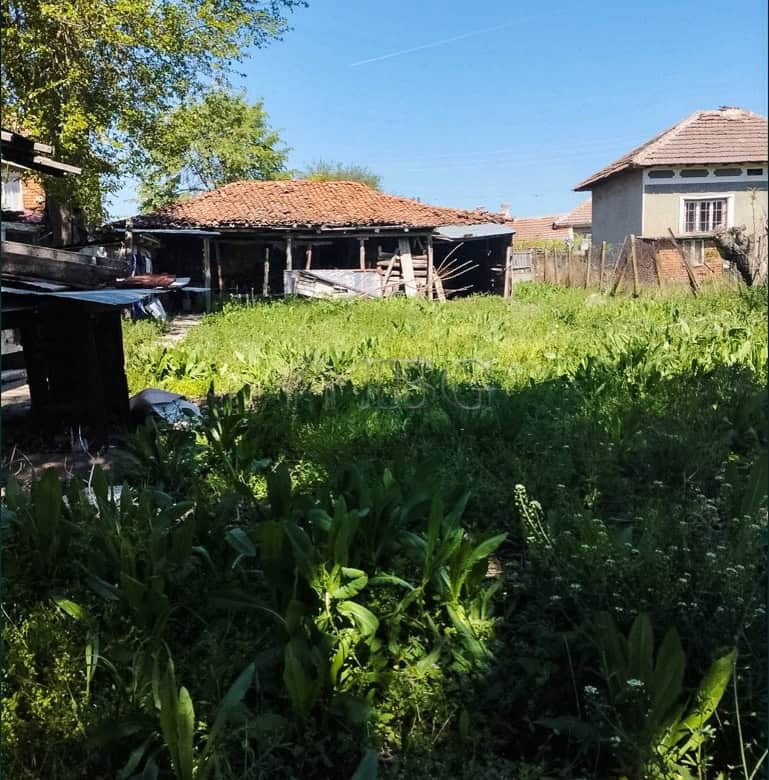 Two-storey house with a large garden in a peaceful village setting. Ideal for families seeking space.