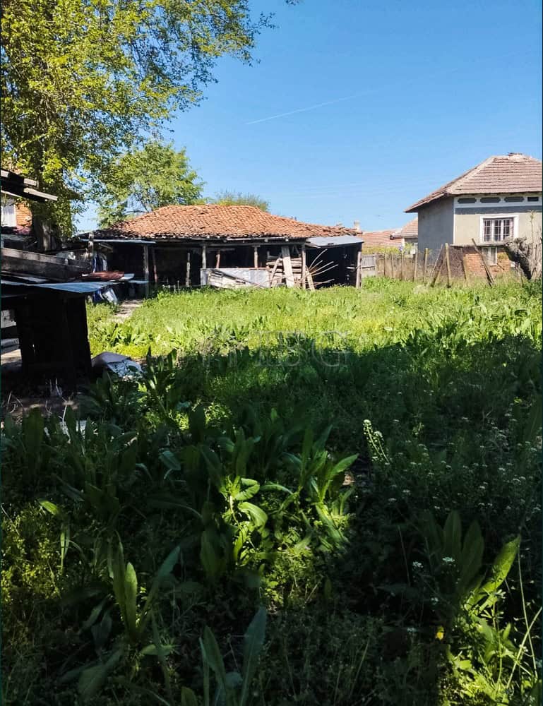Two-storey house with a large garden in a peaceful village setting. Ideal for families seeking space.