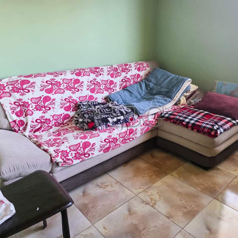 Comfortable living room with sofa and garden view near Sunny Beach.